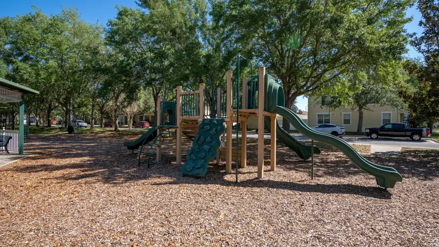 Lake Burden playground with slides under shade trees